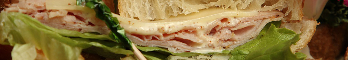 Eating Sandwich at Wings N Things restaurant in Sarasota, FL.